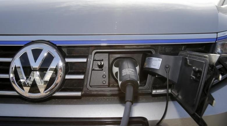 The charging plug of an electric Volkswagen Passat car is pictured at charging station at a VW dealer in Berlin