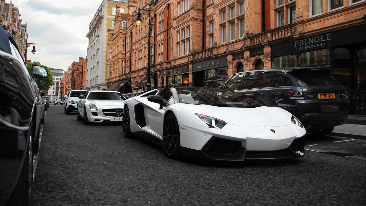 Lamborghini Aventador, Mercedes SLS AMG cruising down the streets of Mayfair
